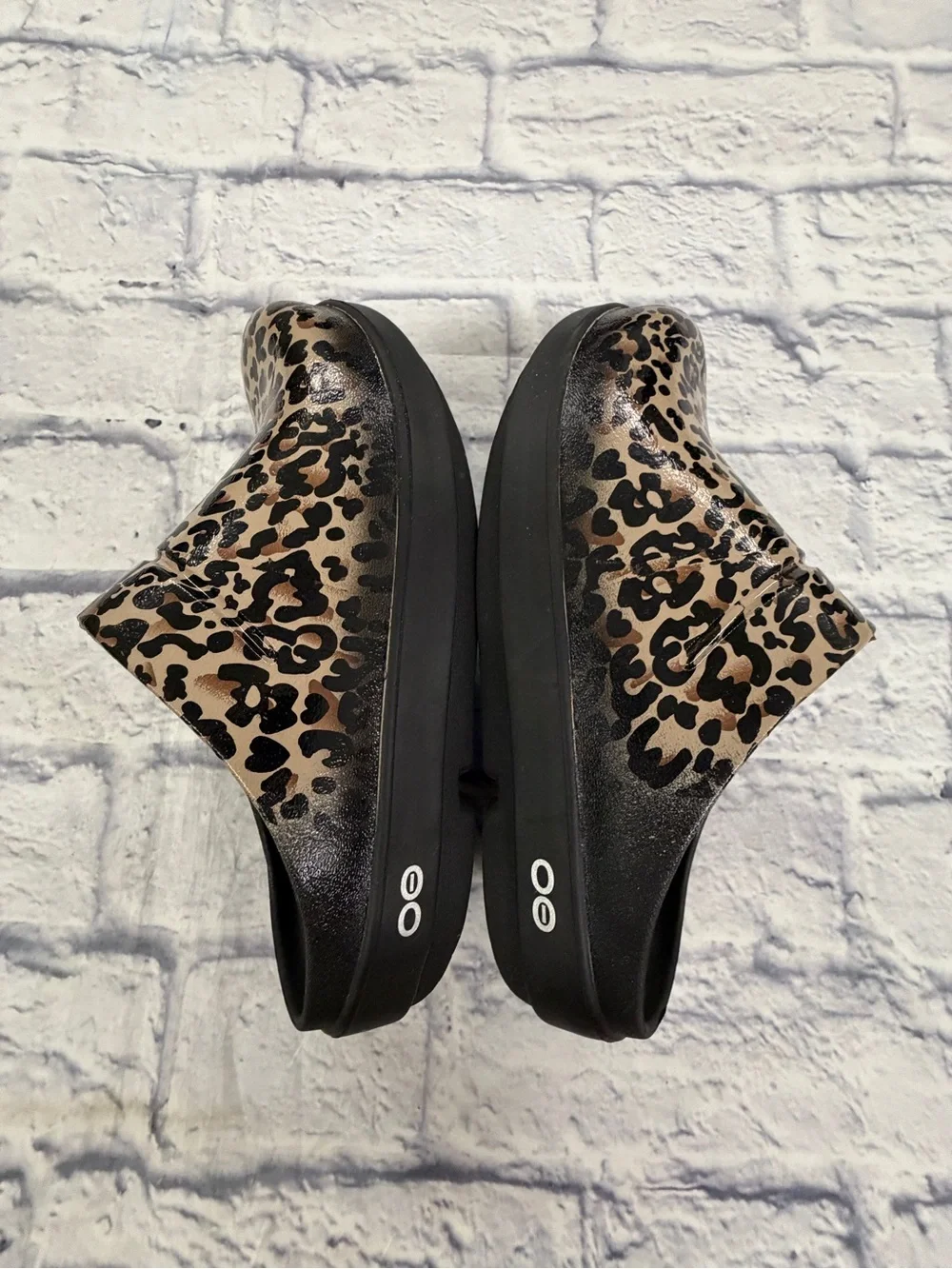 OOFOS ladies size 6 leopard print slip ons. Cushiony and comfortable